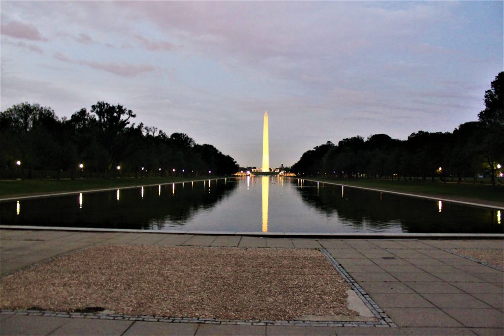 Washington Monument reflecting in the Lincoln Memorial Reflecting Pool, in Washington SC