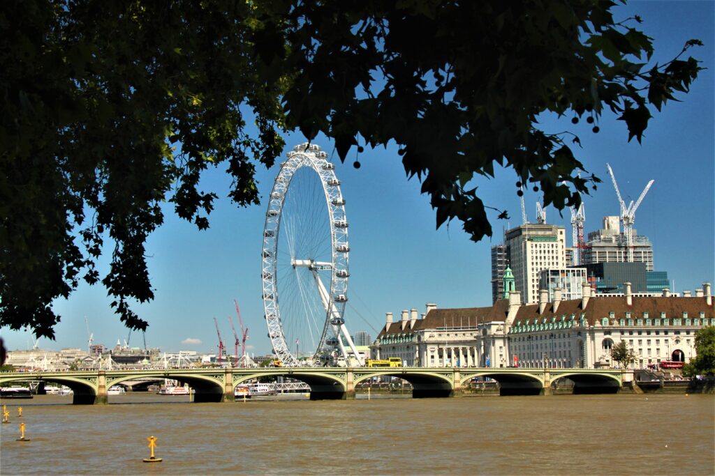 Views along the River Thames, with the London Eye in the distance